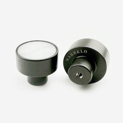 Black handle with white marble