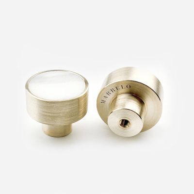 Brass handle with white marble