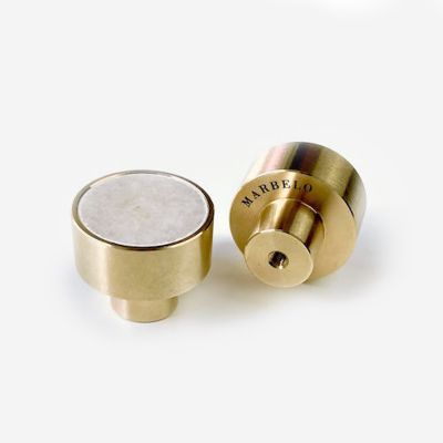 Brass handle with pink marble